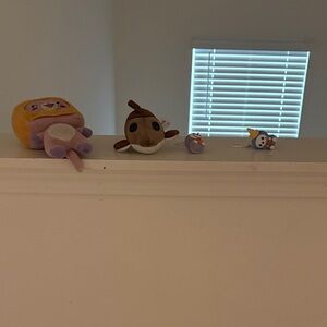 Jack in the box charms and Walmart and GameStop plushies